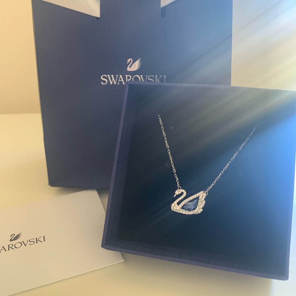 Swarovski necklace dancing swan  rhodium plated .